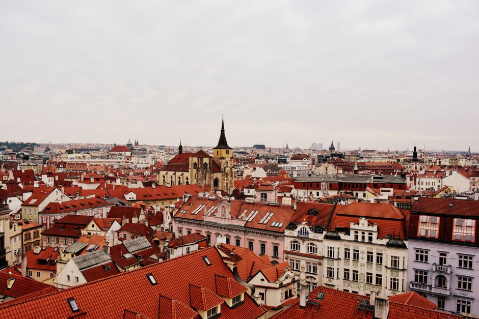 Explore the stunning red rooftops of Prague's historic cityscape from an elevated perspective.