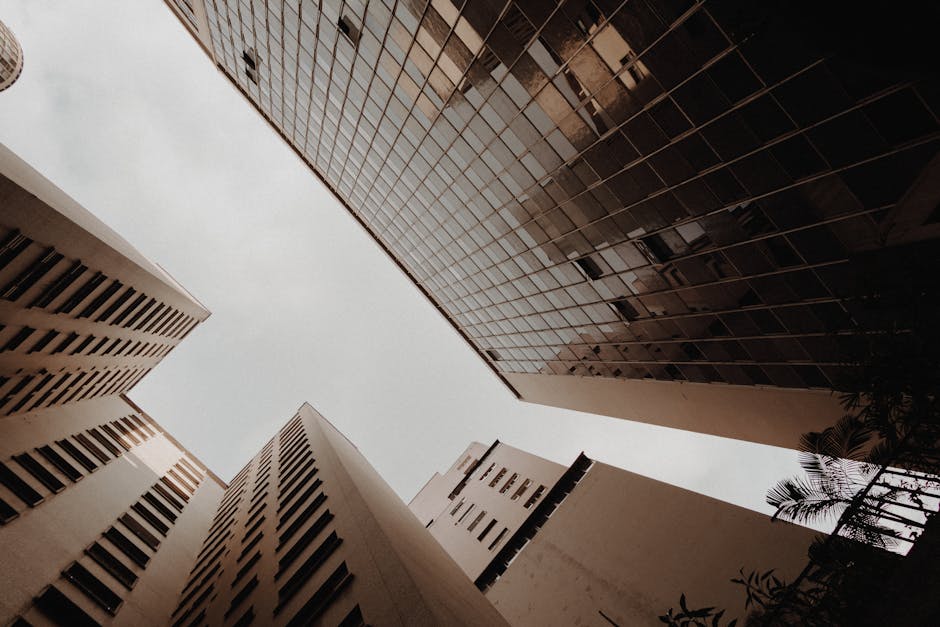 Upward perspective of skyscrapers in São Paulo showing architectural modernity.